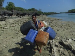 This guy was coming to the main village to collect water.