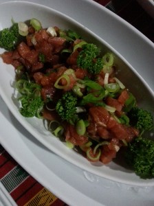 Raw tuna marinated in sesame oil, onions and chili.  